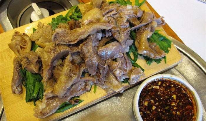 全球吃狗肉最多哪里人,韩国最大狗肉市场