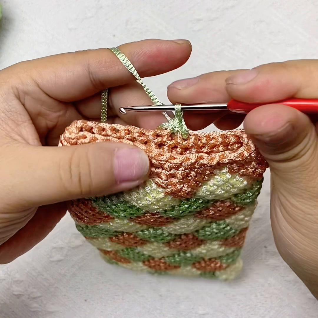 手机包带扣子教程,手机包扣子教程