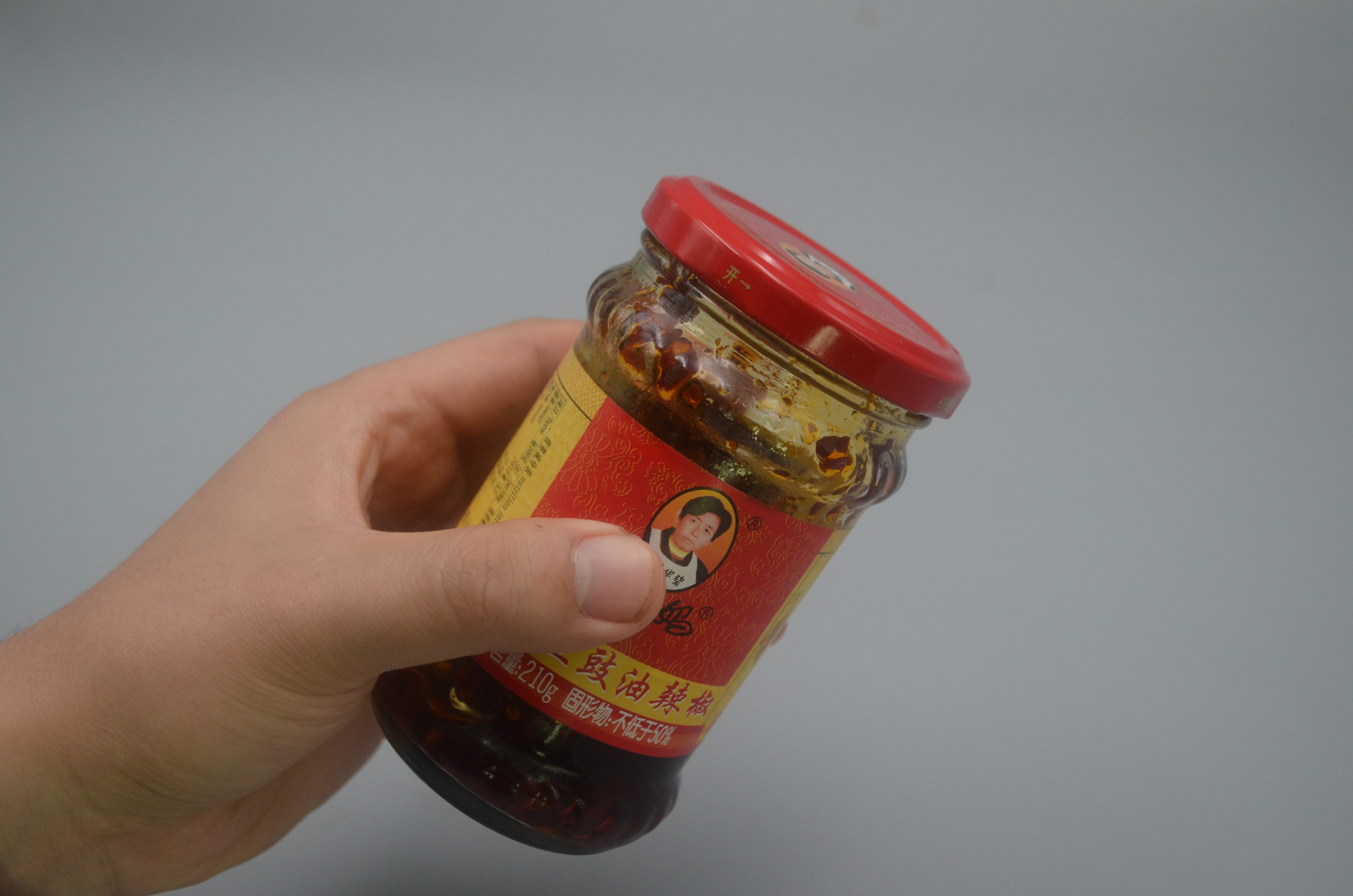 罐头瓶盖有个小机关,罐头瓶上有个小机关怎么开