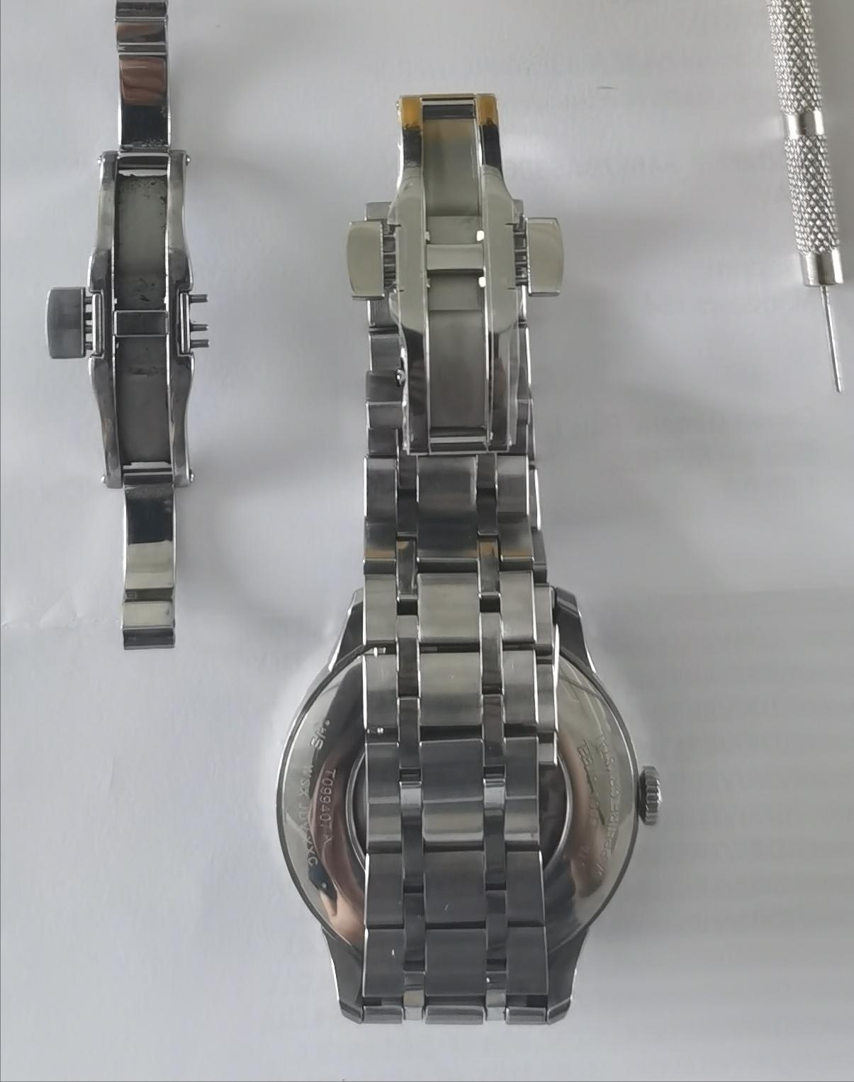 天梭表扣坏了如何打开,天梭表卡扣掉了一边怎么取下来