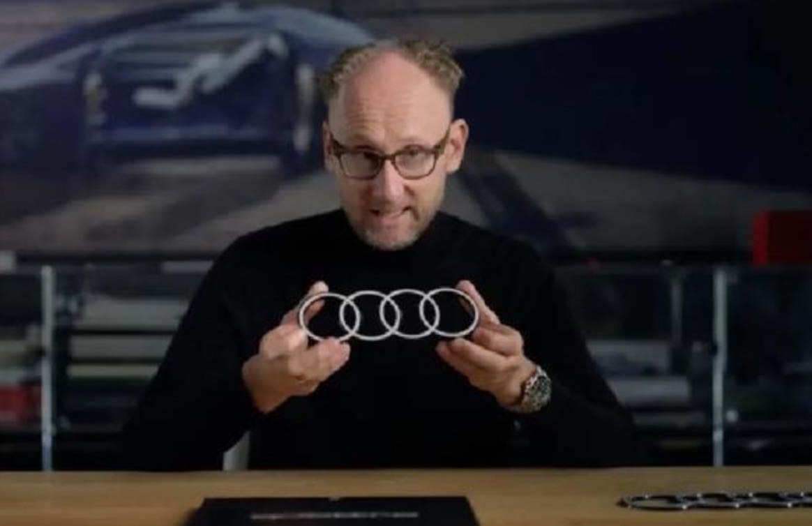 奥迪logo发光,奥迪换新标logo