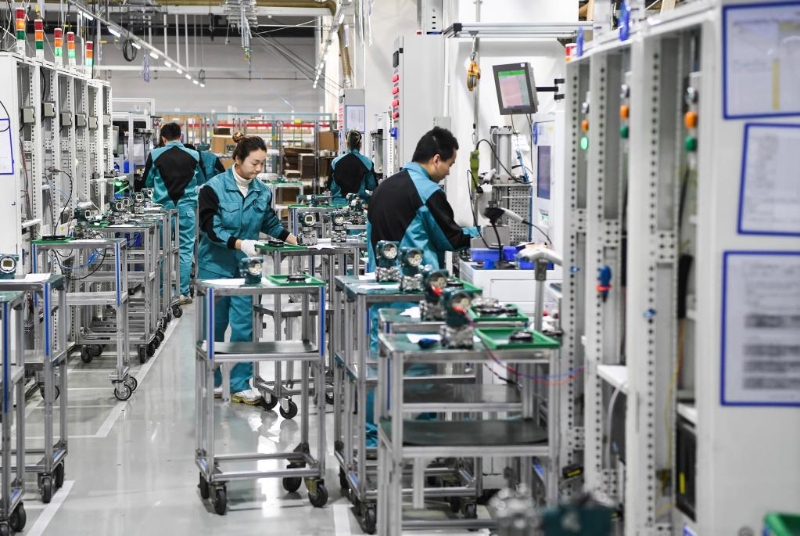 新春走基层企业生产忙,新春走基层节后上班第一天