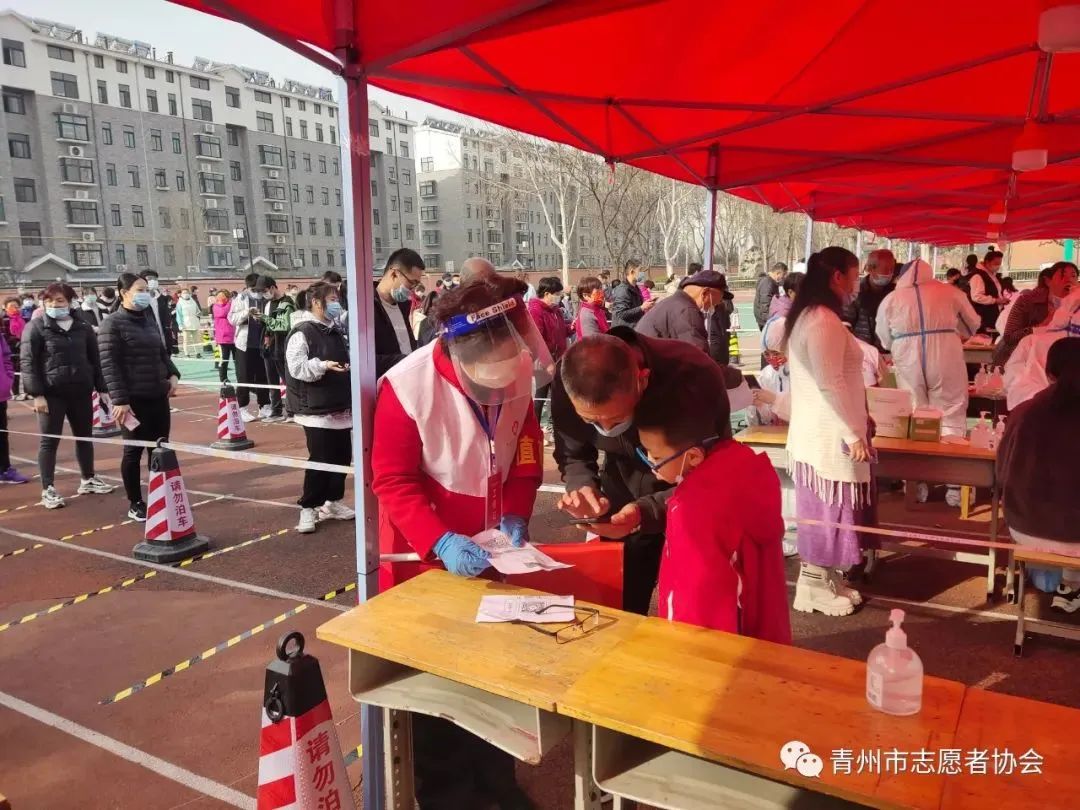 文明实践志愿者抗疫图片,文明风采志愿者